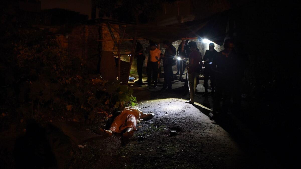 A May 18, 2018, photo shows the bodies of alleged drug dealers killed in a shooting by law enforcement officers in Chittagong, Bangladesh.