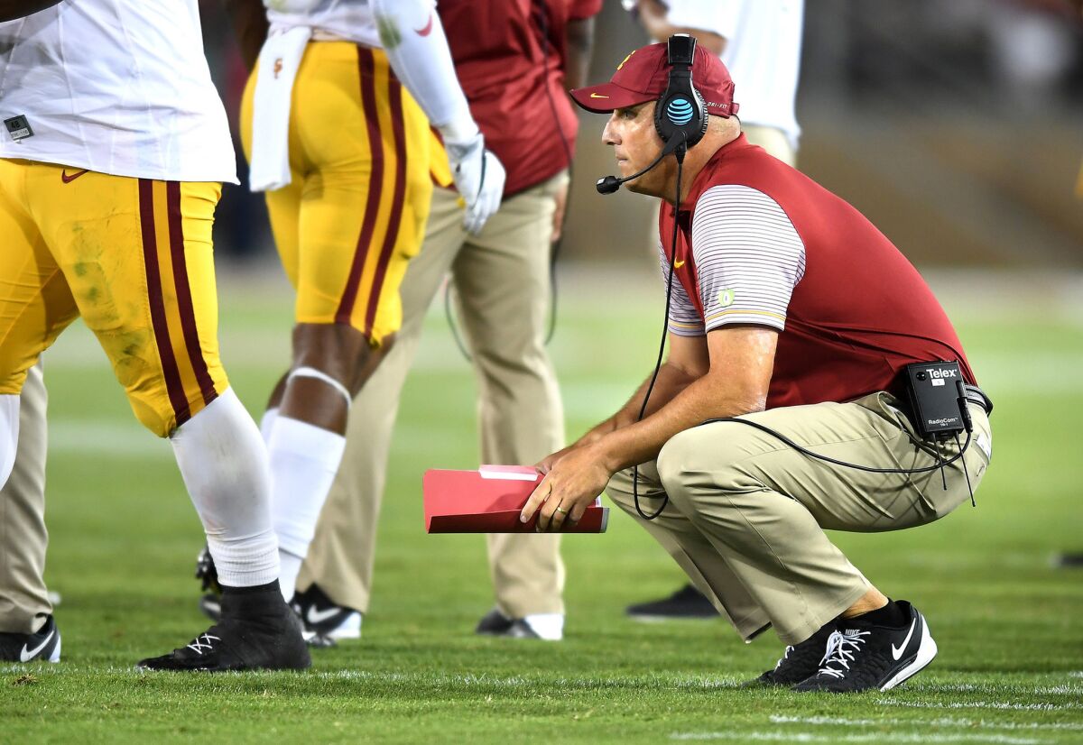Coach Clay Helton reacts after the Trojans turned the ball over on downs to the Cardinal late in the game.