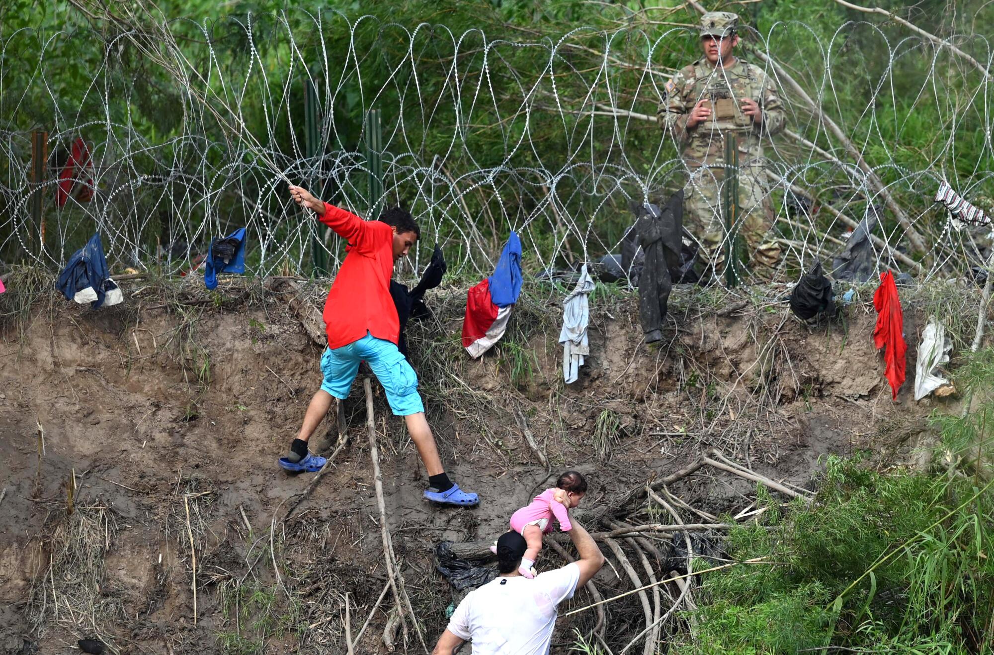 Migrants try to get to the U.S. after crossing the Rio Grande from Matamoros, Mexico.