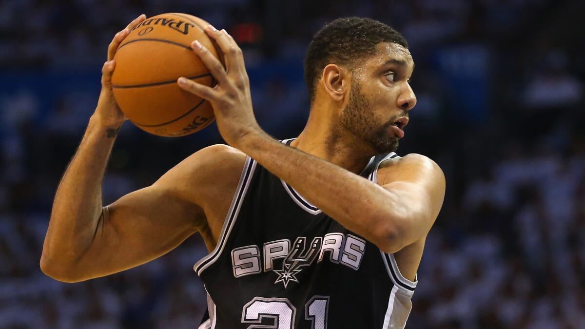 The San Antonio Spurs' Tim Duncan is shown. Hall of Famer Kareem Abdul-Jabbar has picked the Spurs to win the NBA Finals over the Miami Heat.