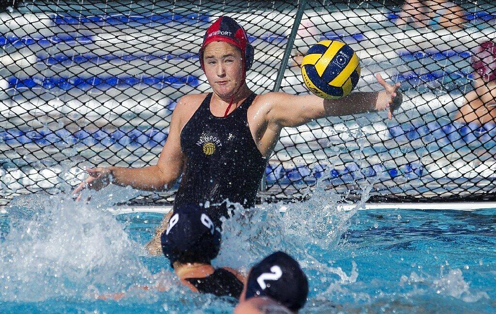 Newport Harbor High's Carlee Kapana blocks a shot during a semifinal match against Foothill in the Holiday Cup on Saturday.
