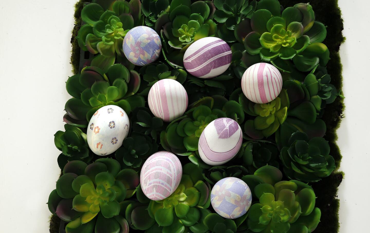 Easter eggs dyed with silk ties technique.