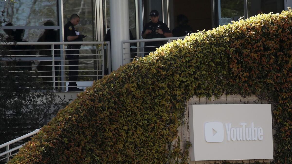 Police officers at YouTube's headquarters in San Bruno, Calif., after the shooting Tuesday.