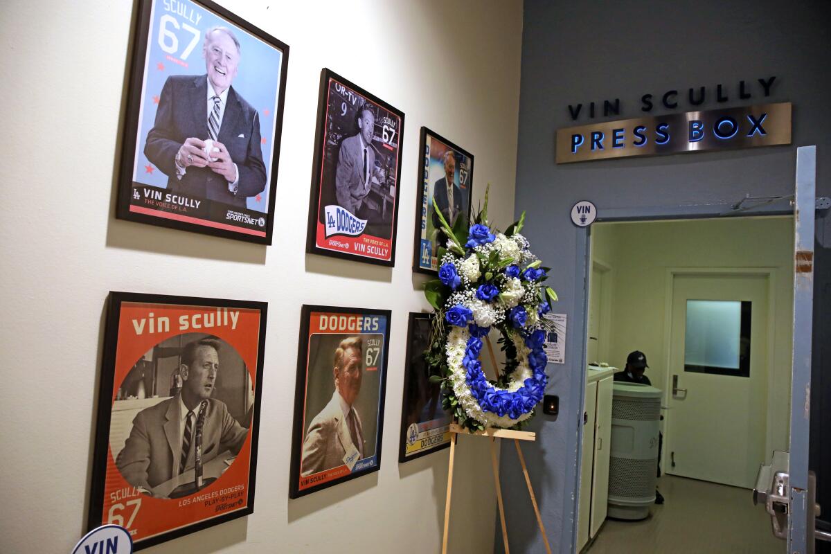 The Dodgers pay tribute to legendary broadcaster Vin Scully in the Dodger Stadium press box.