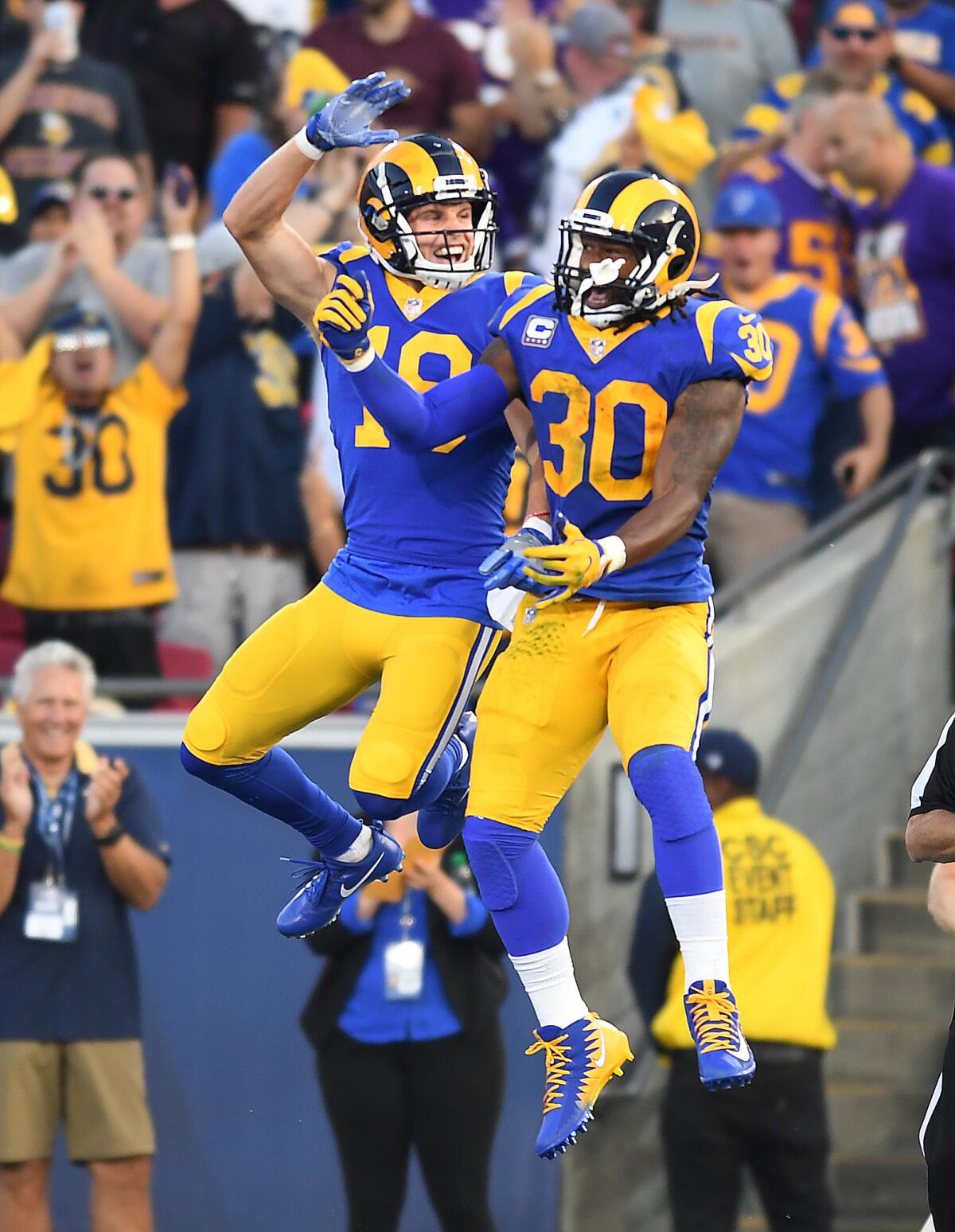 Rams receiver Cooper Kupp, left, celebrates his long touchdown catch with running back Todd Gurley II against the Vikings in the second quarter on Sept. 27.