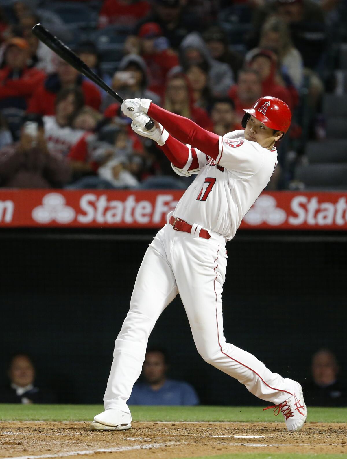 Angels' Shohei Ohtani hits an RBI double to right field off of Cleveland Guardians starting pitcher Logan Allen.
