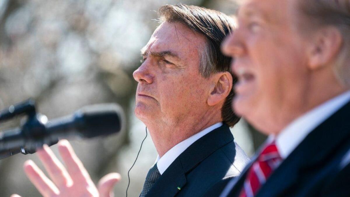 President Trump and Brazilian President Jair Bolsonaro speak at a new conference in the White House Rose Garden on March 19, 2019.