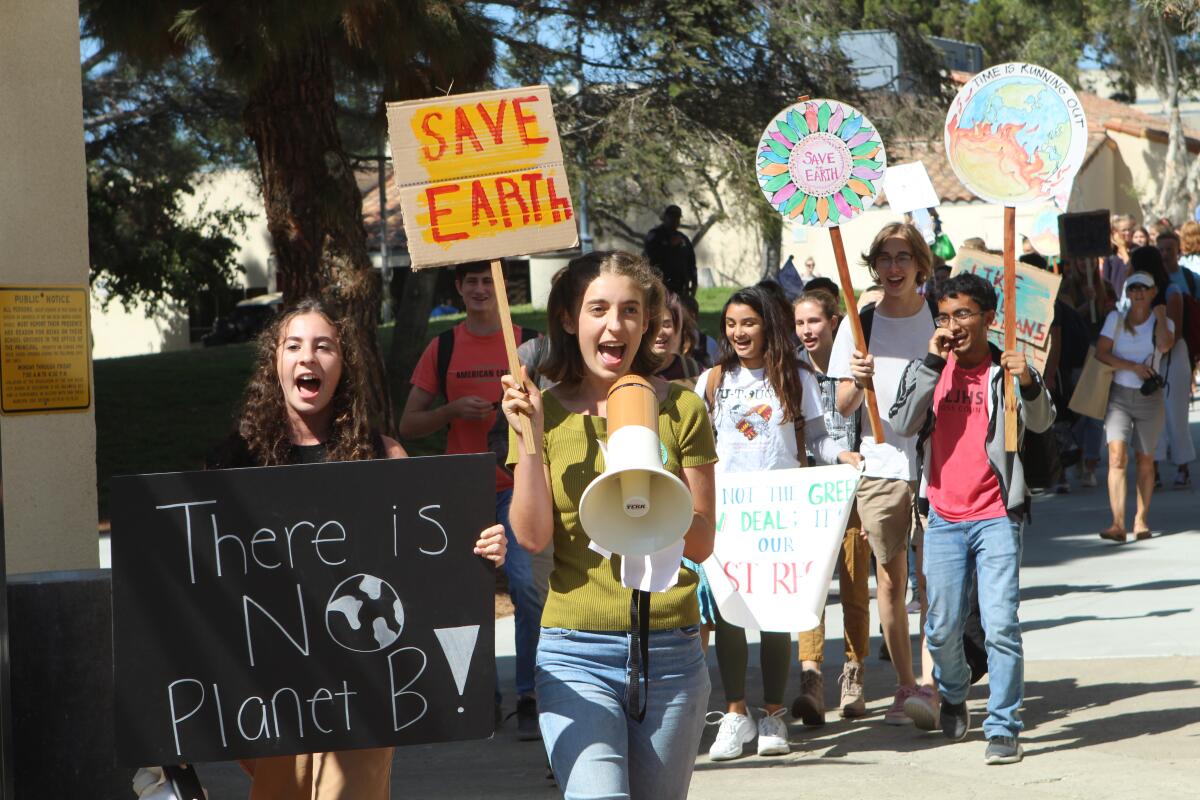About 100 La Jolla High School students walked out of school 45 minutes early on Friday, Sept. 20, as part of the Global Climate Strike. Students chanted and carried signs supporting climate action.
