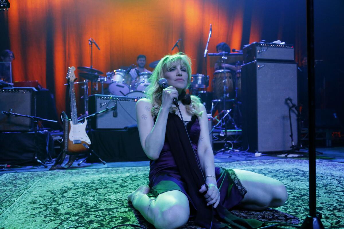 Courtney Love joined the Cabin Down Below band for a rendition of "Silver Springs."