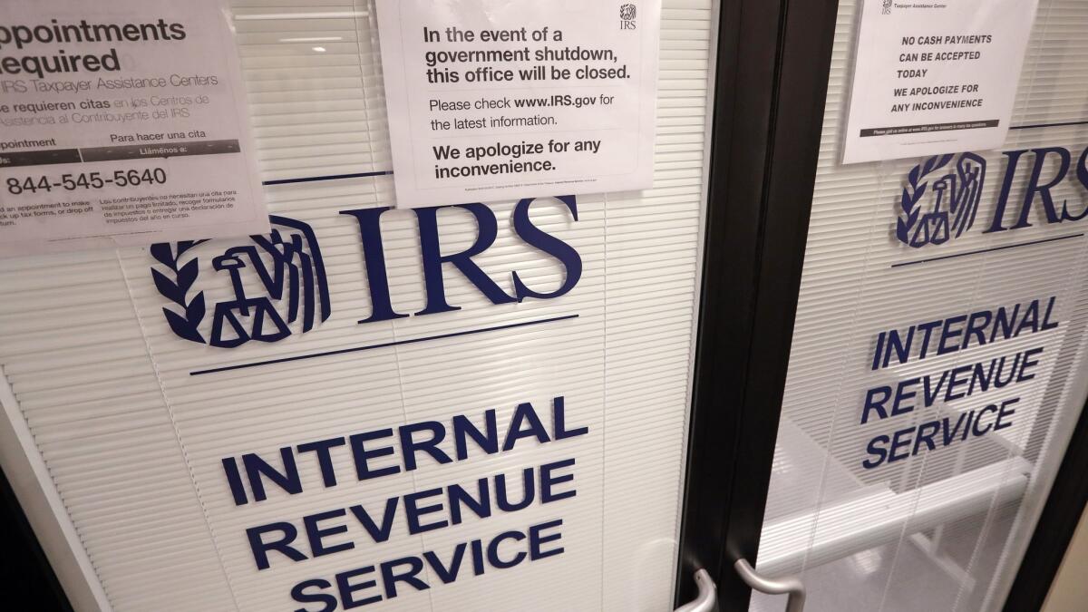 The doors of this IRS office in Seattle were closed during the 35-day partial government shutdown.