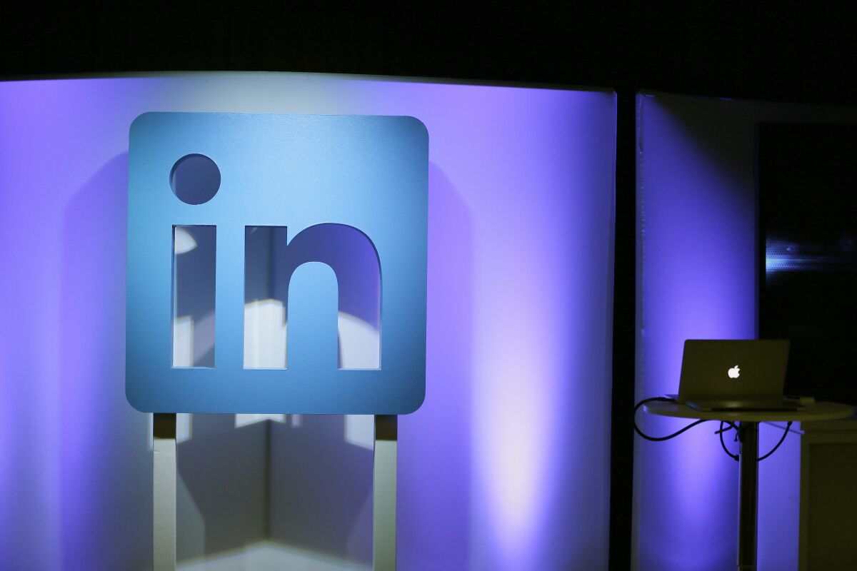The LinkedIn logo is displayed during a product announcement in San Francisco.