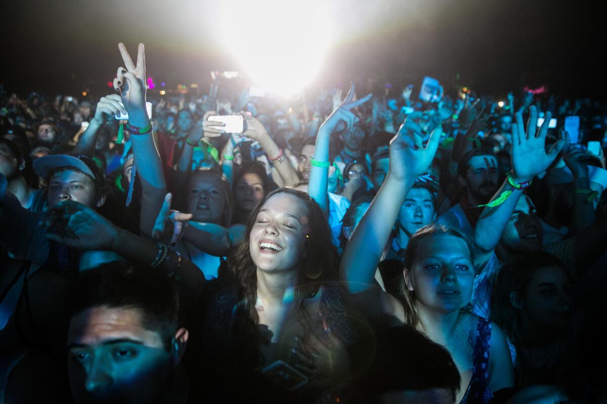 An art biennial will soon be held alongside the Coachella Valley Music and Arts Festival. Seen here: a crowd during the 2015 music fest.