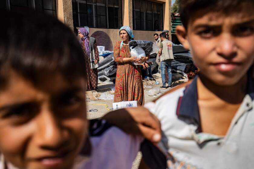 Displaced Syrians take refuge in Tal Tamr in Syria’s Hasakeh province.