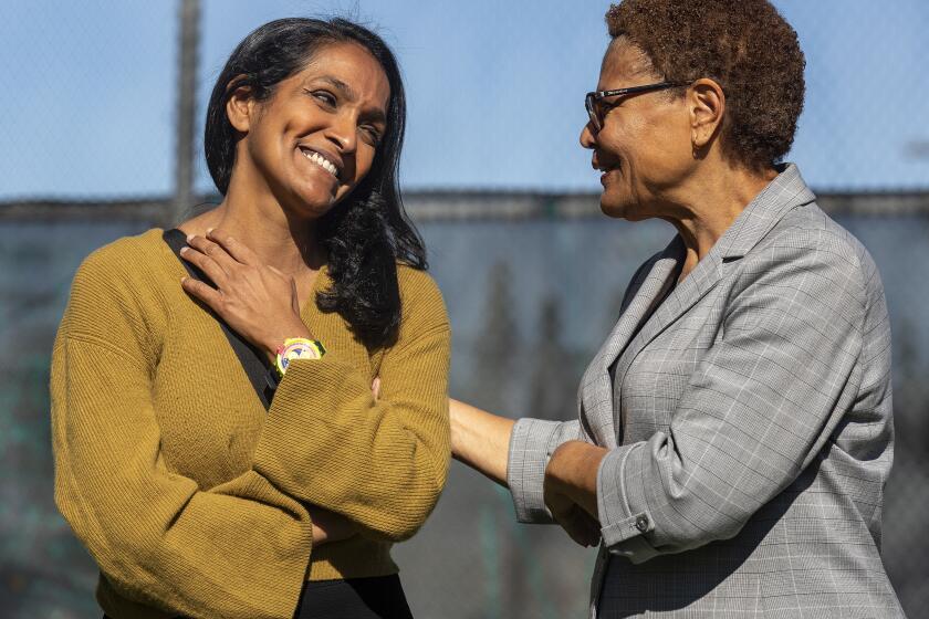 SHERMAN OAKS, CA-February 10, 2024:Los Angeles City Councilmember Nithya Raman, left, talks with Mayor Karen Bass at Hazeltine Park in Sherman Oaks where supporters gathered before heading out for a door to door canvas. Raman is facing a vigorous challenge from deputy city attorney Ethan Weaver and the mayor is campaigning for her. (Mel Melcon / Los Angeles Times)