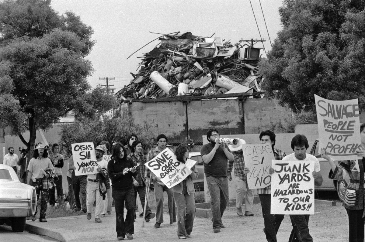A group demonstrating against the junkyards march around Chicano Park. Photo shot April 12, 1978. UT photo file