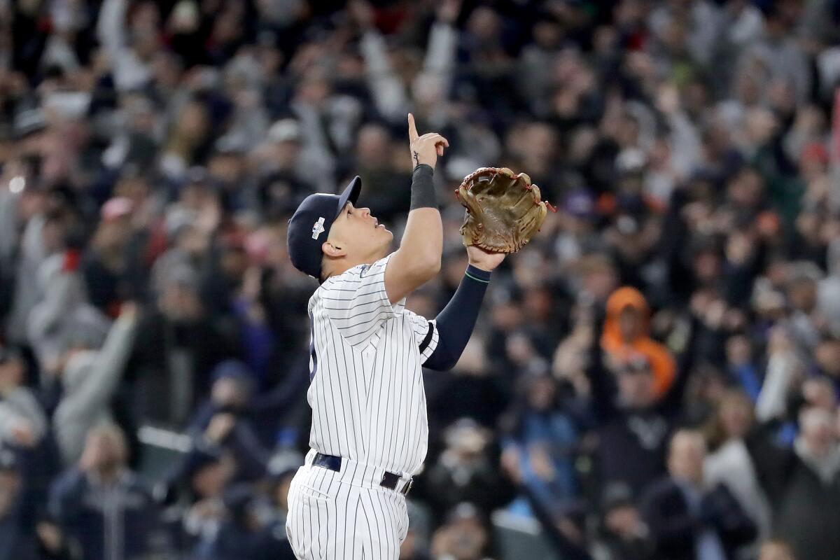NEW YORK, NEW YORK - OCTOBER 18: Gio Urshela #29 of the New York Yankees celebrates after defeating the Houston Astros in game five of the American League Championship Series with a score of 4 to 1 at Yankee Stadium on October 18, 2019 in New York City. (Photo by Elsa/Getty Images) ** OUTS - ELSENT, FPG, CM - OUTS * NM, PH, VA if sourced by CT, LA or MoD **