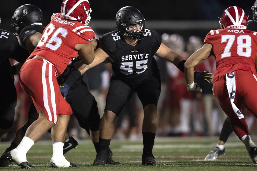 Long Beach, CA - November 26: Servite's Mason Graham (55) takes his stance during the CIF Southern Championship.