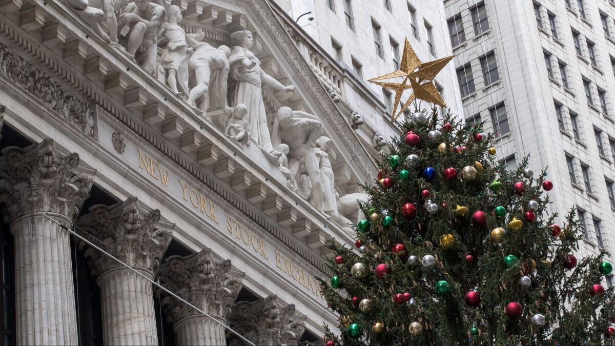 A Christmas tree stands outside the New York Stock Exchange.