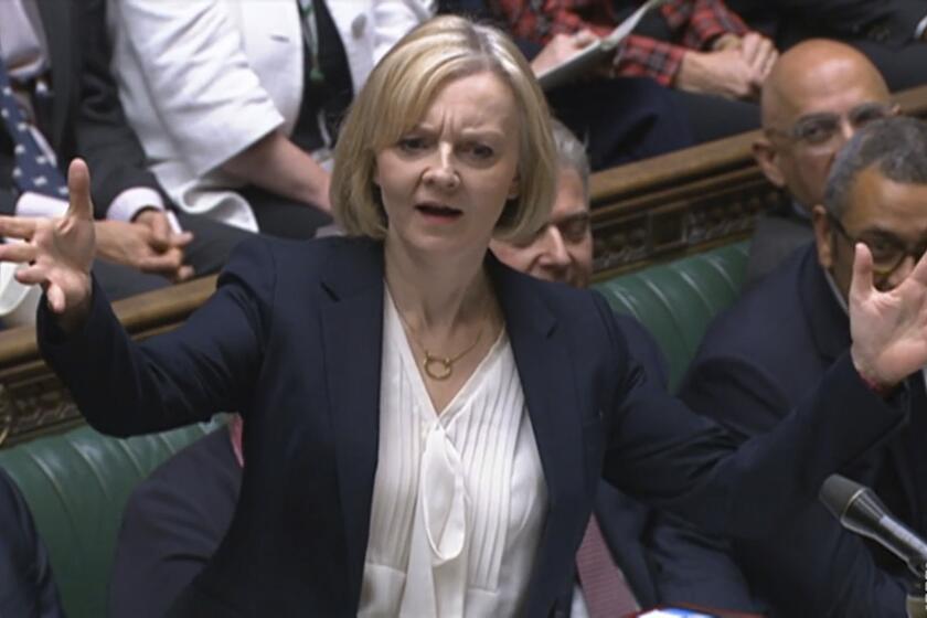 In this grab taken from video from the House of Commons, Prime Minister Liz Truss speaks during Prime Minister's Questions in the House of Commons in London, Wednesday Oct. 19, 2022. (House of Commons/PA via AP)