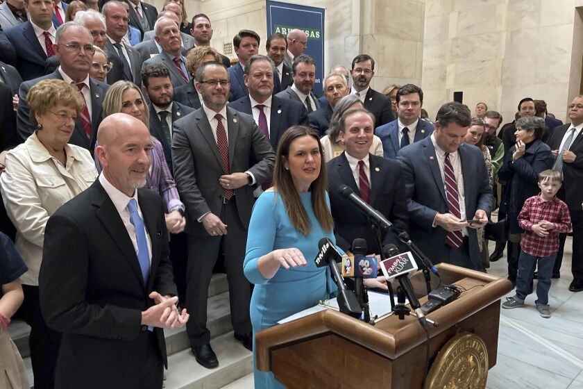 Arkansas Gov. Sarah Huckabee Sanders answers reporters' questions at a news conference at the state Capitol in Little Rock, Ark., Wednesday, Feb. 8, 2023, about an education reform bill she's proposing. (AP Photo/Andrew DeMillo)