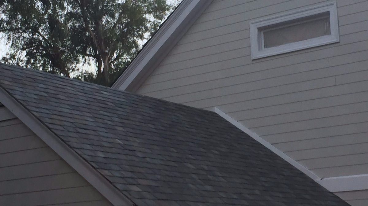 A solar tile roof, like the kind that Tesla and SolarCity plan to produce, is seen on an old "Desperate Housewives" home at Universal Studios Hollywood.