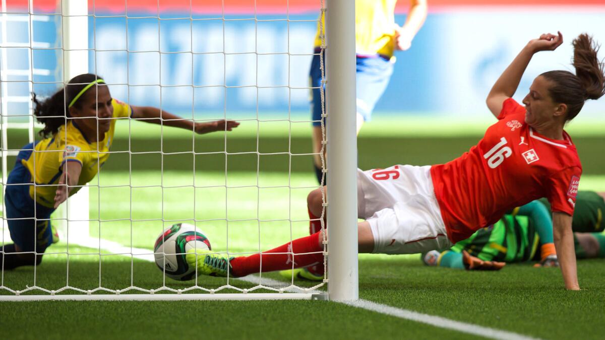 Switzerland's Fabienne Humm scores her third goal against Ecuador in a Women's World Cup group game on Friday.