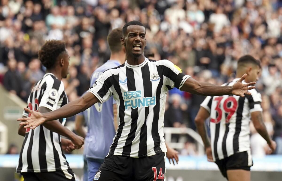 Newcastle United's Alexander Isak celebrates scoring his side's first goal during the English Premier League soccer match between Newcastle United and Bournemouth, at St James' Park, in Newcastle, England, Saturday, Sept. 17, 2022. (Owen Humphreys/PA via AP)