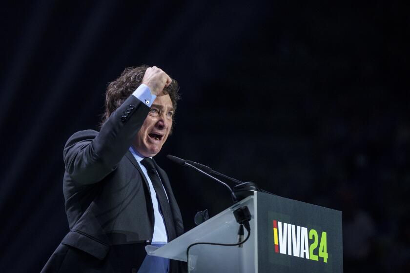 FILE - Argentina's president Javier Milei gestures as he delivers a speech on stage during the Spanish far-right wing party Vox's rally "Europa Viva 24" in Madrid, Spain, Sunday, May 19, 2024. A diplomatic crisis between historic allies Spain and Argentina expanded Tuesday, May 21, 2024, as Spain pulled its ambassador from Buenos Aires and Argentine President Javier Milei lambasted the move as “nonsense typical of an arrogant socialist.” (AP Photo/Manu Fernandez, File)