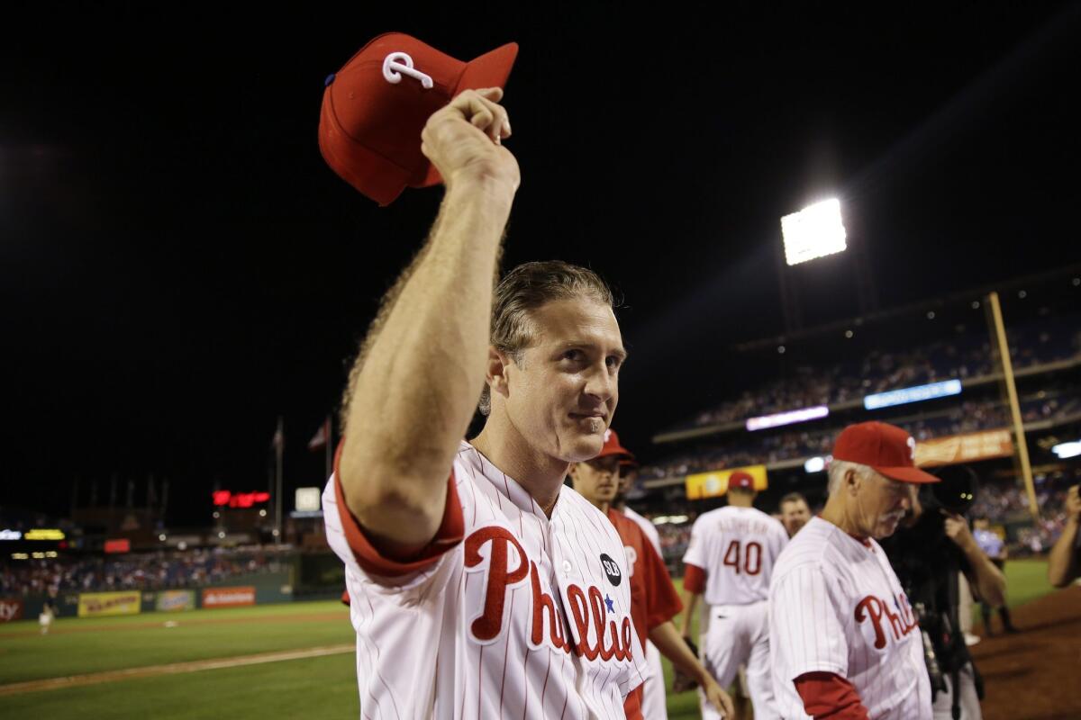 Philadelphia Phillies' Chase Utley acknowledges cheers from the crowd after a baseball game against the Toronto Blue Jays, Wednesday, Aug. 19, 2015, in Philadelphia. Philadelphia won 7-4. (AP Photo/Matt Slocum)