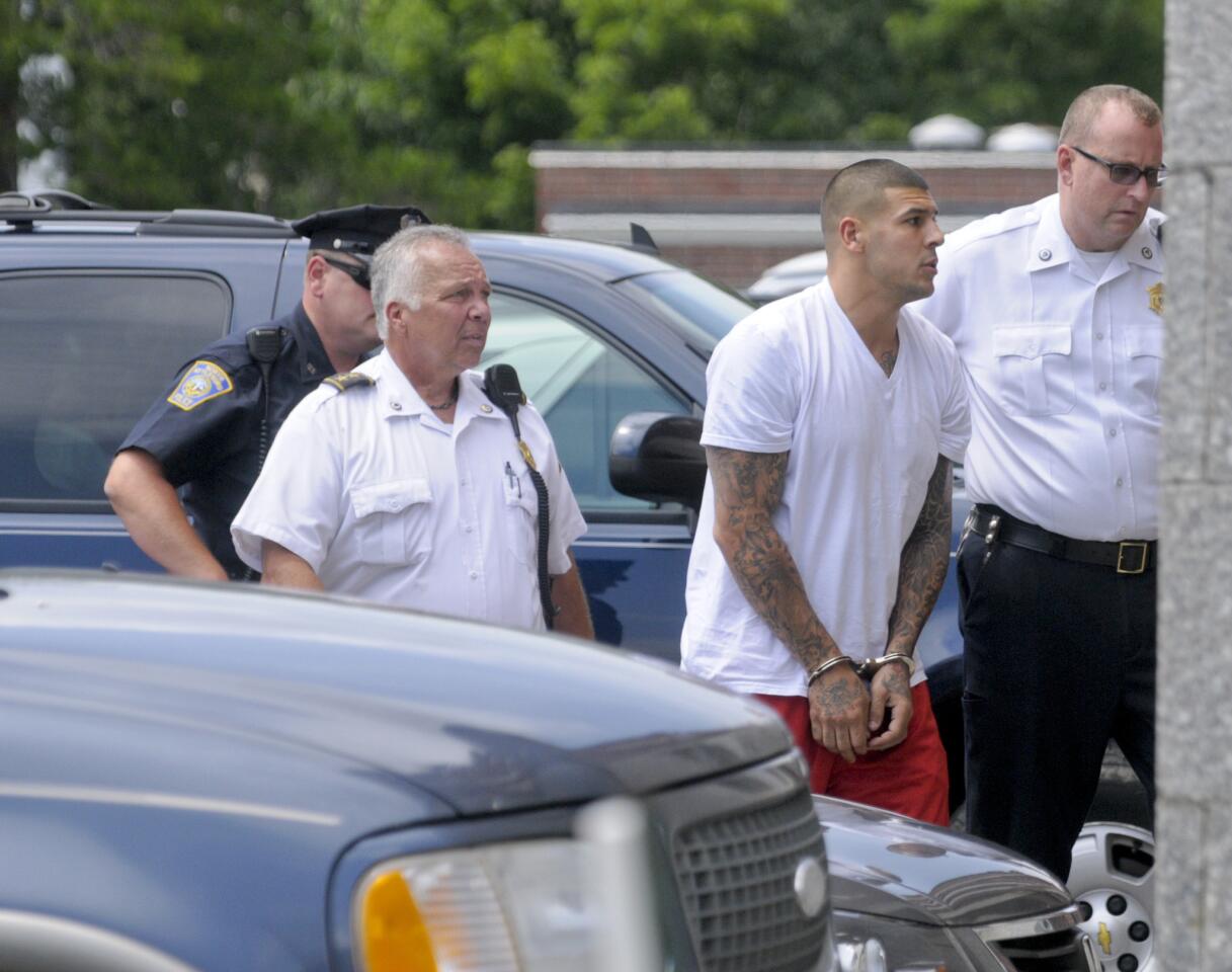 Former New England Patriot tight end Aaron Hernandez arrives to the Attleboro District Court House Wednesday afternoon.