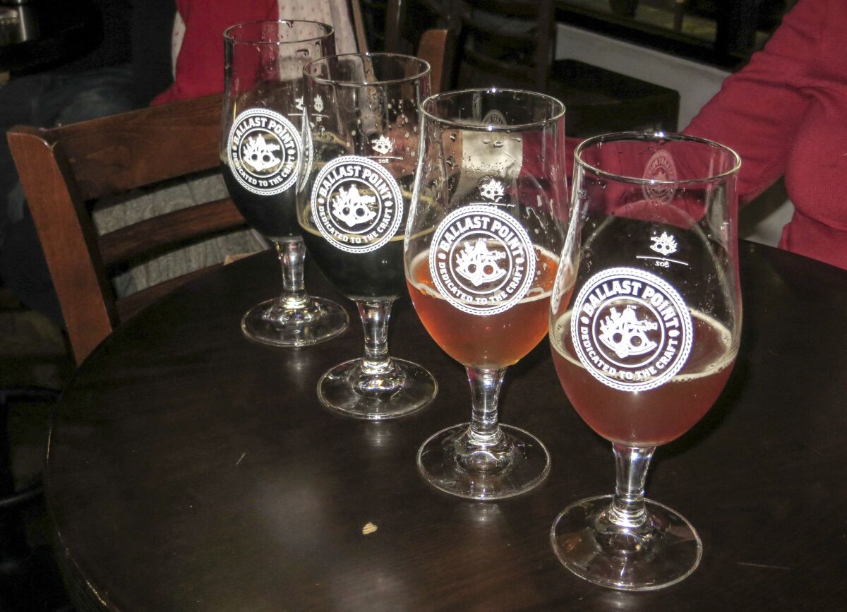 Tasters at Ballast Point Brewing in Little Italy. (Irene Lechowitzky)