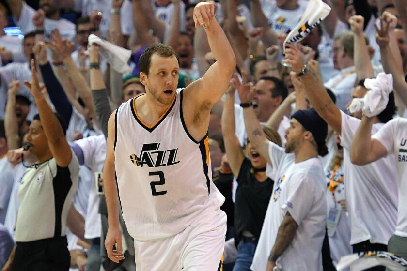 Jazz forward Joe Ingles celebrates after making a three-point basket late in the game against the Clippers during a game last season.