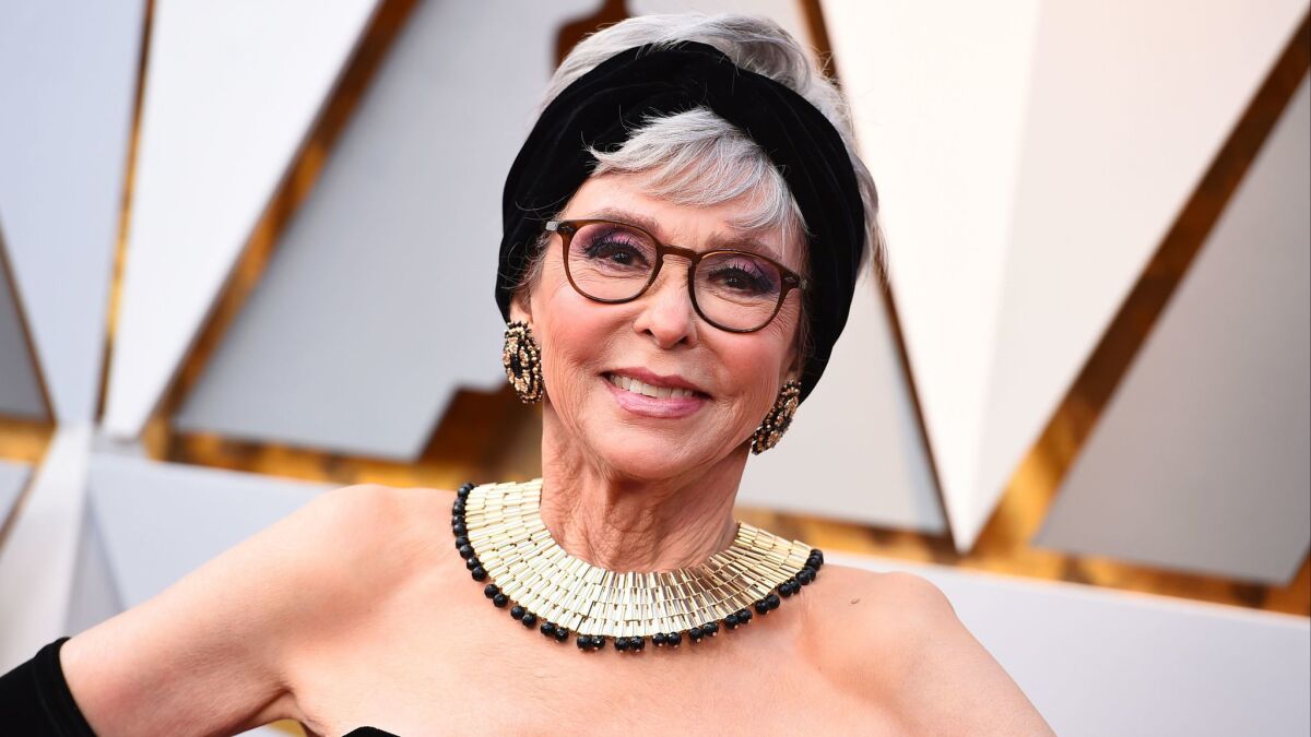 Rita Moreno arrives at the Oscars on Sunday at the Dolby Theatre in Los Angeles.
