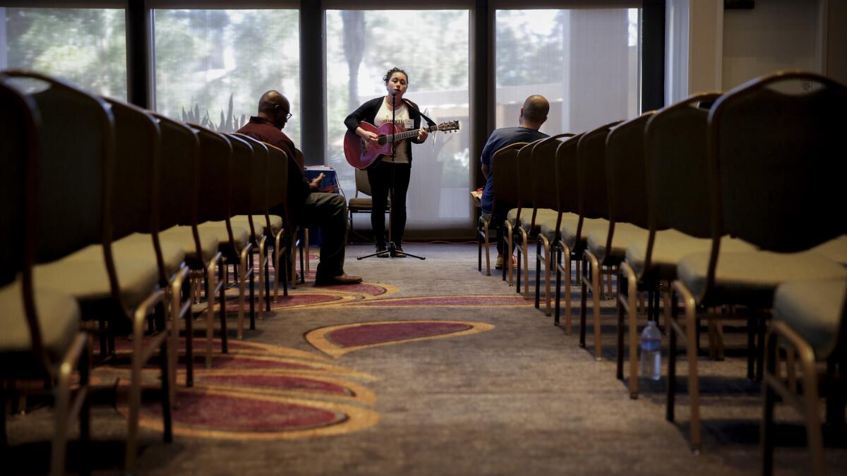 Beth Jimenez performs at a weekend seminar put on by Actors, Models & Talent for Christ.