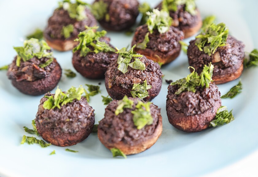 Stuffed Mushrooms With Duxelles, which incorporates shallots or onions and parsley, can be adapted to your own taste.