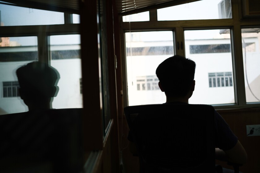 Silhouette of a man at the window