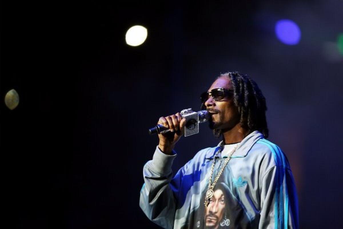 Rapper Snoop Dogg performs during the 2013 BET Experience at Staples Center on Saturday .