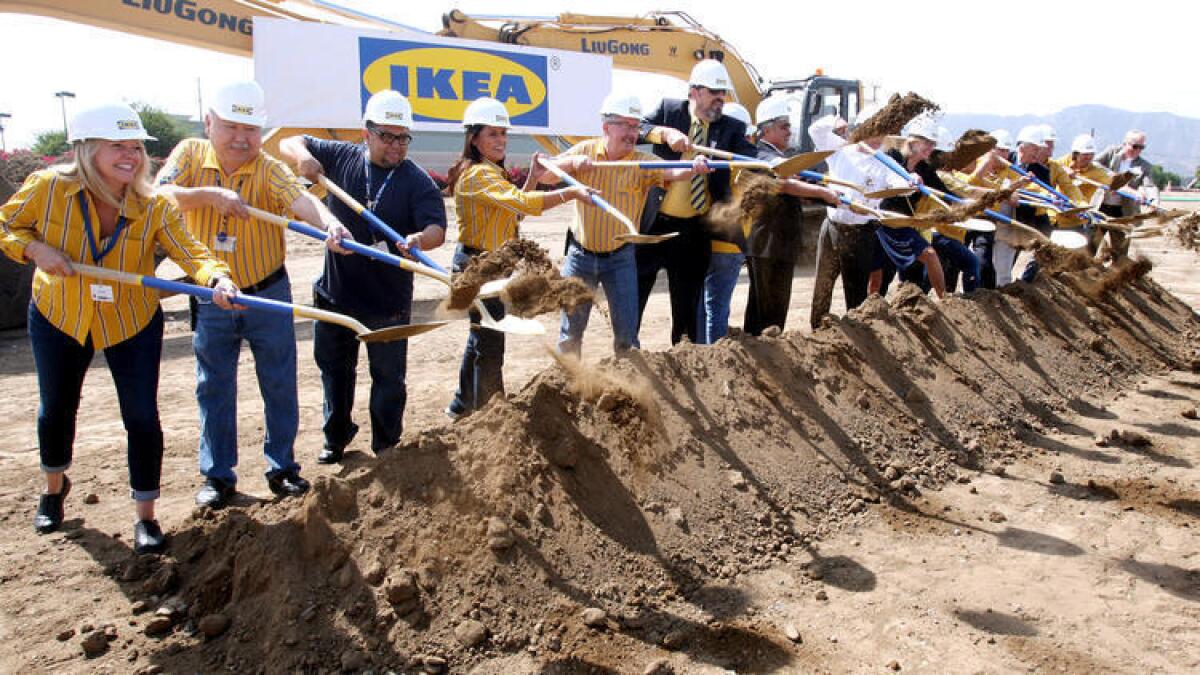 IKEA employees and city officials throw the ceremonial dirt as construction begins for the new IKEA in Burbank on Tuesday, Sept. 1, 2015. When completed, the new 456,000 sq. ft. store, on 22 acres on San Fernando Rd., will be the largest one in the United States.