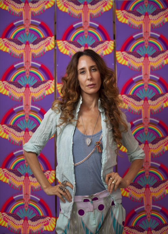 Fashion designer Mara Hoffman poses for a portrait in her showroom. Hoffman is known for her colorful prints and earthy aesthetic.