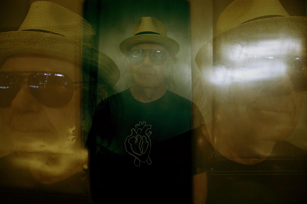 A multiple exposure portrait of Neil Young.