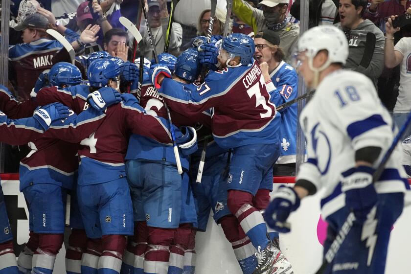 The Colorado Avalanche celebrate after an overtime goal by Andre Burakovsky in Game 1.