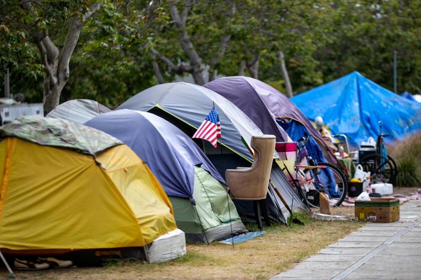 VENICE, CA - MAY 23: A a large number of tents make up the homeless encampment outside Abbot Kinney Memorial Branch Library on Monday, May 23, 2022 in Venice, CA. (Jason Armond / Los Angeles Times)