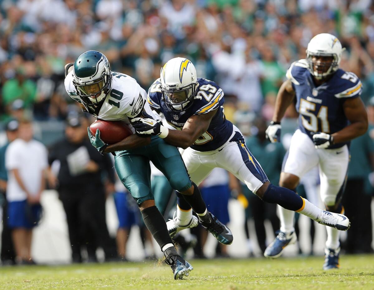 Philadelphia wide receiver DeSean Jackson, left, is taken down by San Diego cornerback Shareece Wright during the fourth quarter of the Chargers' 33-30 win in 2013.