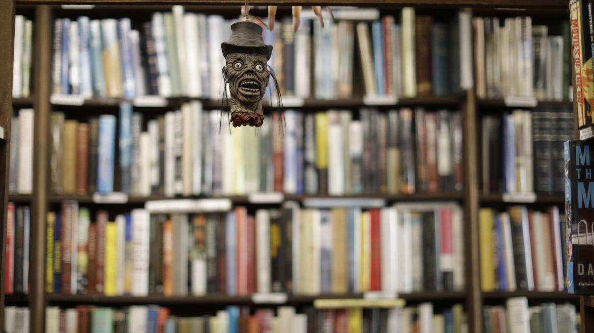 Halloween decorations left up year round are scattered throughout the store at Sam: Johnson's Bookshop in Mar Vista.
