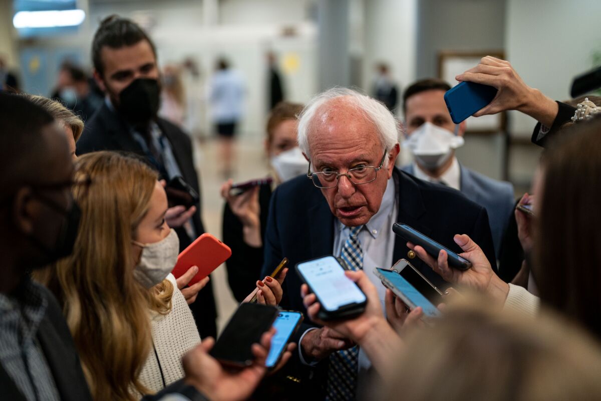 Sen. Bernie Sanders speaks with reporters. 