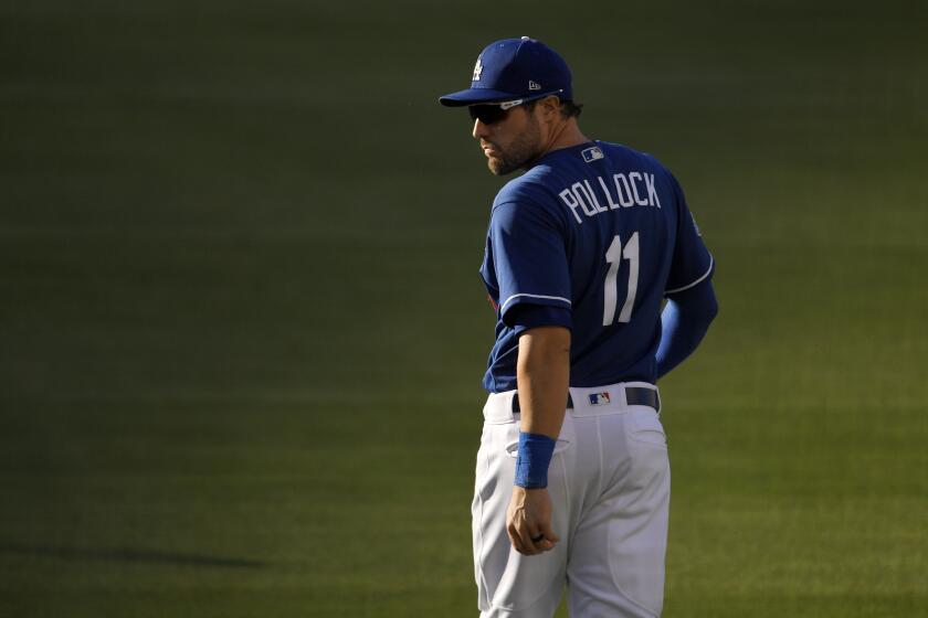 Los Angeles Dodgers' A.J. Pollock warms up prior to an intrasquad baseball game Wednesday, July 15, 2020, in Los Angeles. (AP Photo/Mark J. Terrill)