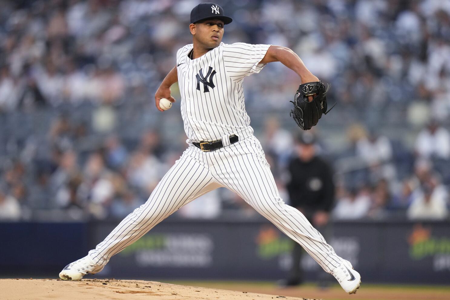 New York Yankees' Ron Marinaccio pitches during the seventh inning in the  second baseball game of a doubleheader against the Chicago White Sox,  Thursday, June 8, 2023, in New York. (AP Photo/Frank