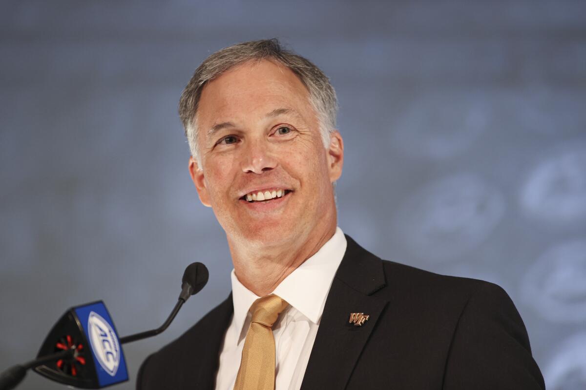 FILE - Wake Forest head coach Dave Clawson answers a question during an NCAA college football news conference at the Atlantic Coast Conference Media Days in Charlotte, N.C., Thursday, July 22, 2021. Wake Forest is set to start its season Sept. 1, 2022, against Virginia Military Institute. (AP Photo/Nell Redmond, File)