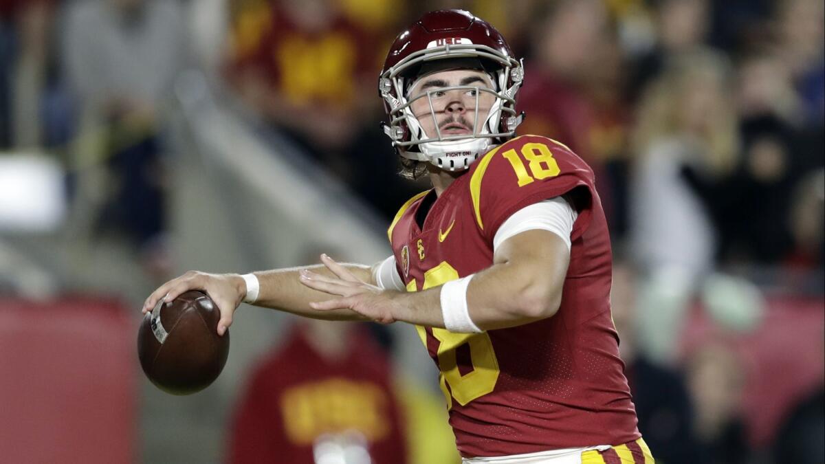 USC quarterback JT Daniels throws a pass during a game last season.