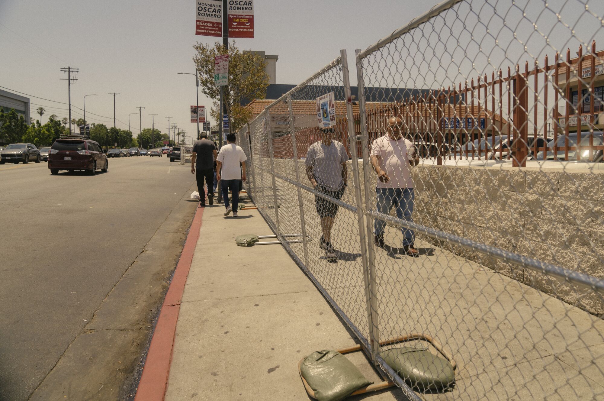 Fencing was installed in May on the sidewalk along parts of the El Salvador Community Corridor on Vermont Avenue.